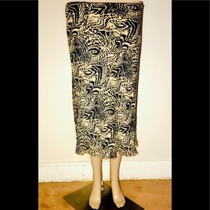 XOXO tan and black pattern skirt.